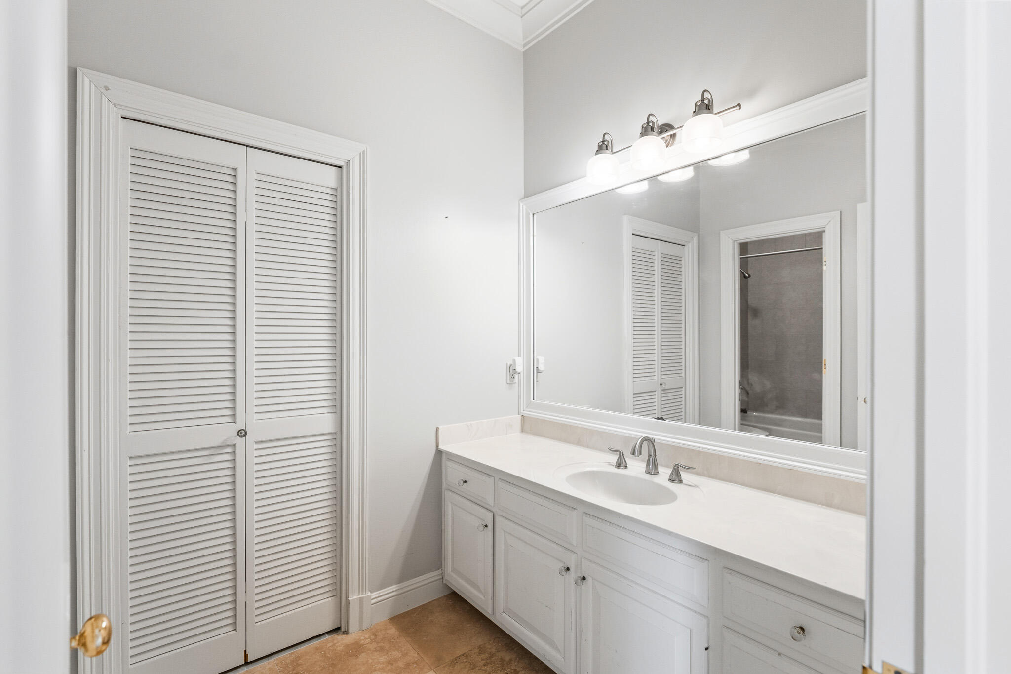 8 Weekewachee Circle Destin, FL 32541 - Photo 39 of 55 a bathroom with a double vanity sink and a mirror