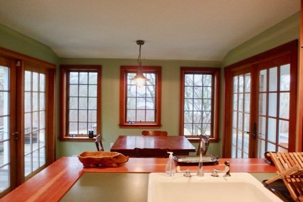 56 Chilmark Road Chilmark, MA 02535 - Photo 2 of 8 a living room with furniture and floor to ceiling windows