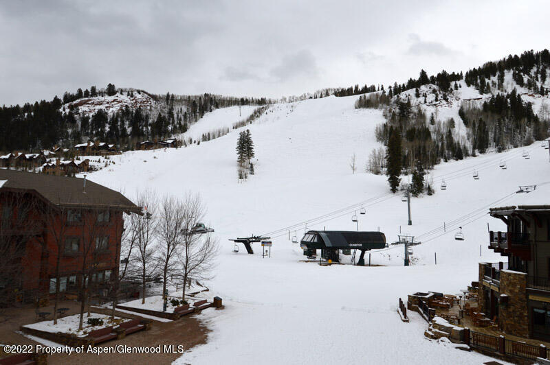 75 Prospector Road, Unit 841012 Aspen, CO 81611 - Photo 24 of 43 a view of a house with a patio