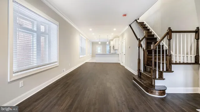 a view of entryway with wooden floor