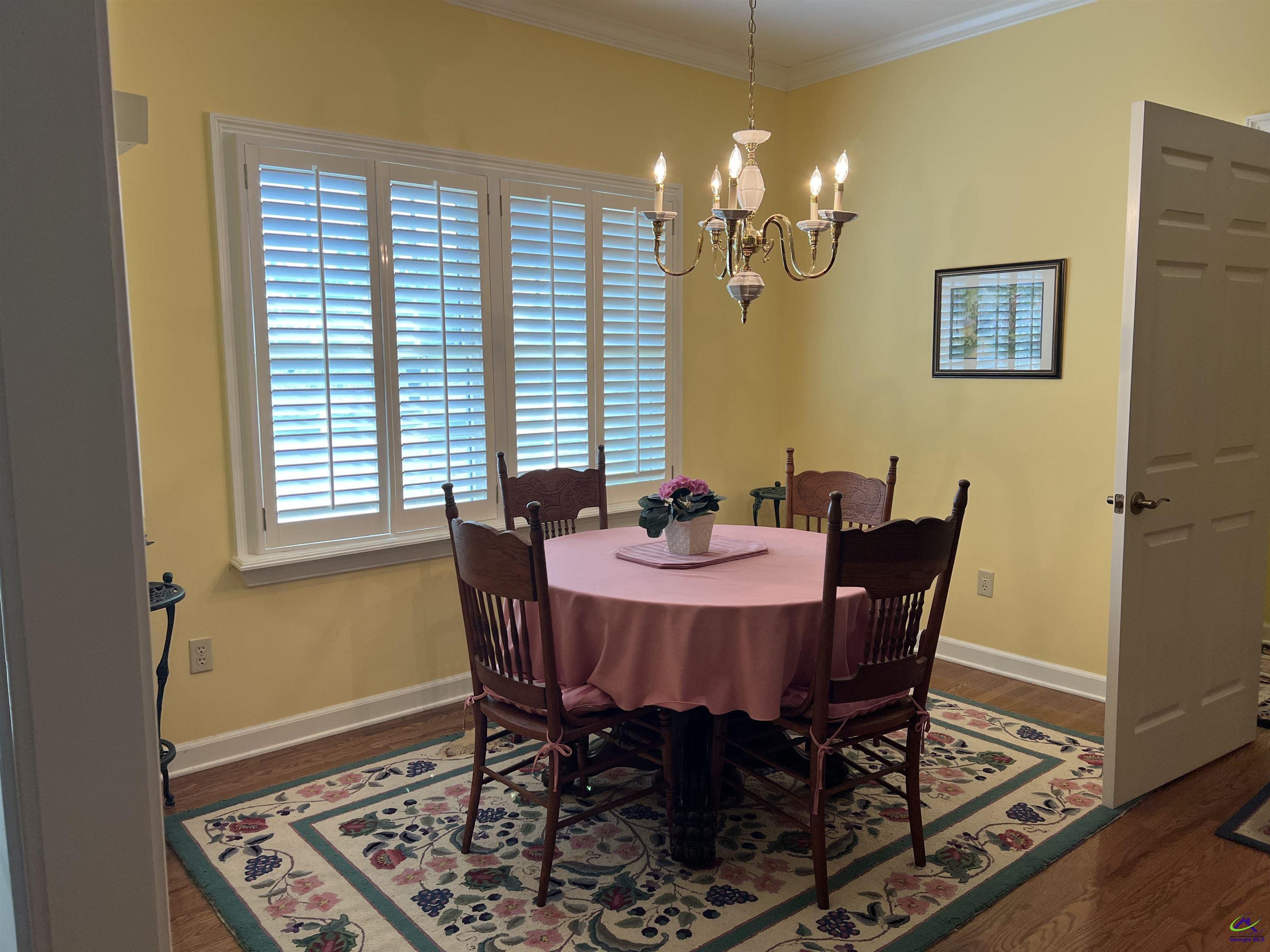 762 Nicholson-Carr Road Chester, GA 31012 - Photo 8 of 81 a view of a dining room with furniture and chandelier