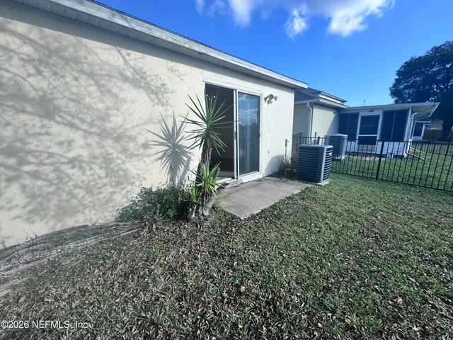 a view of a backyard with plants