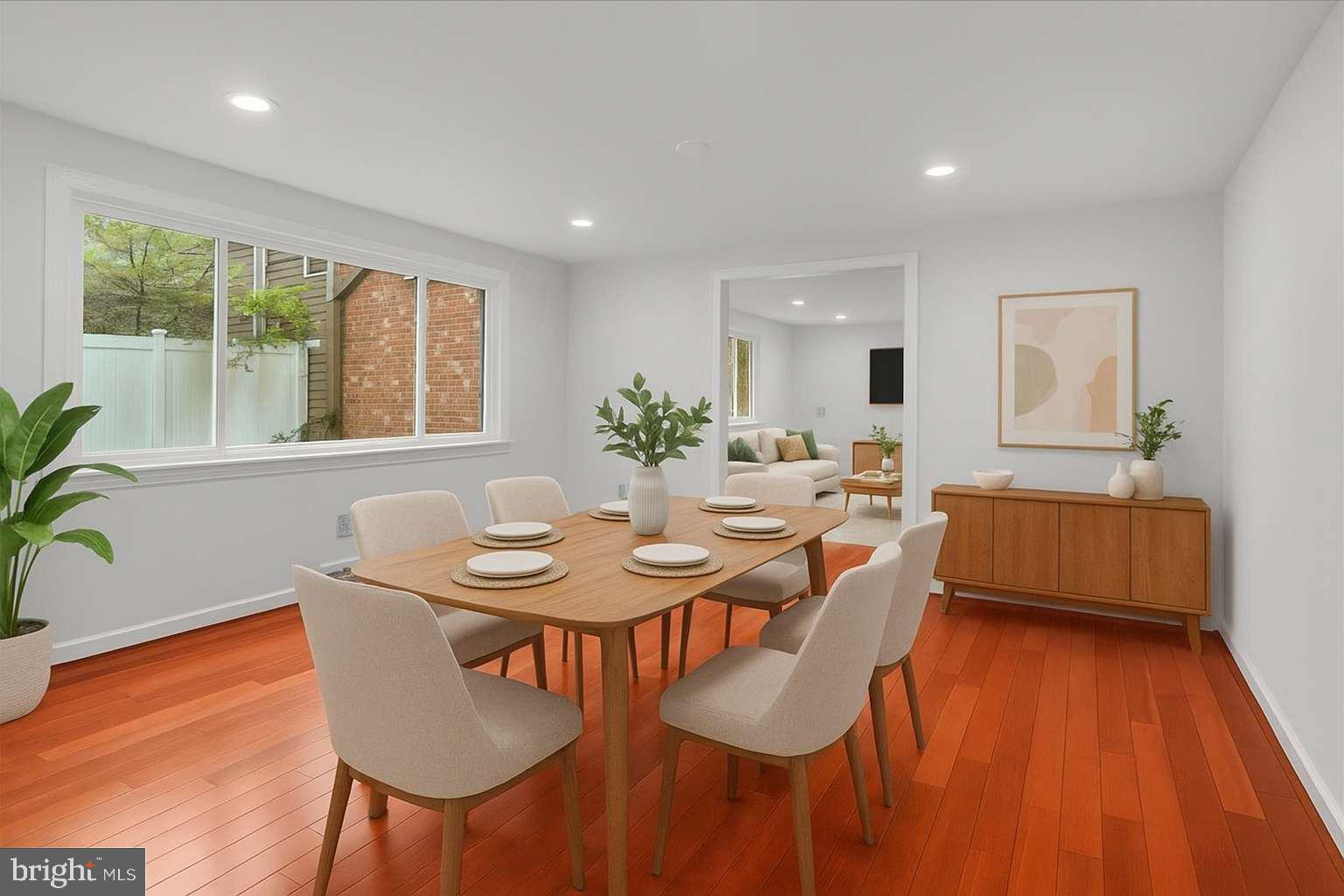 114 Partree Road Cherry Hill, NJ 08003 - Photo 12 of 44 a dining room with furniture and wooden floor