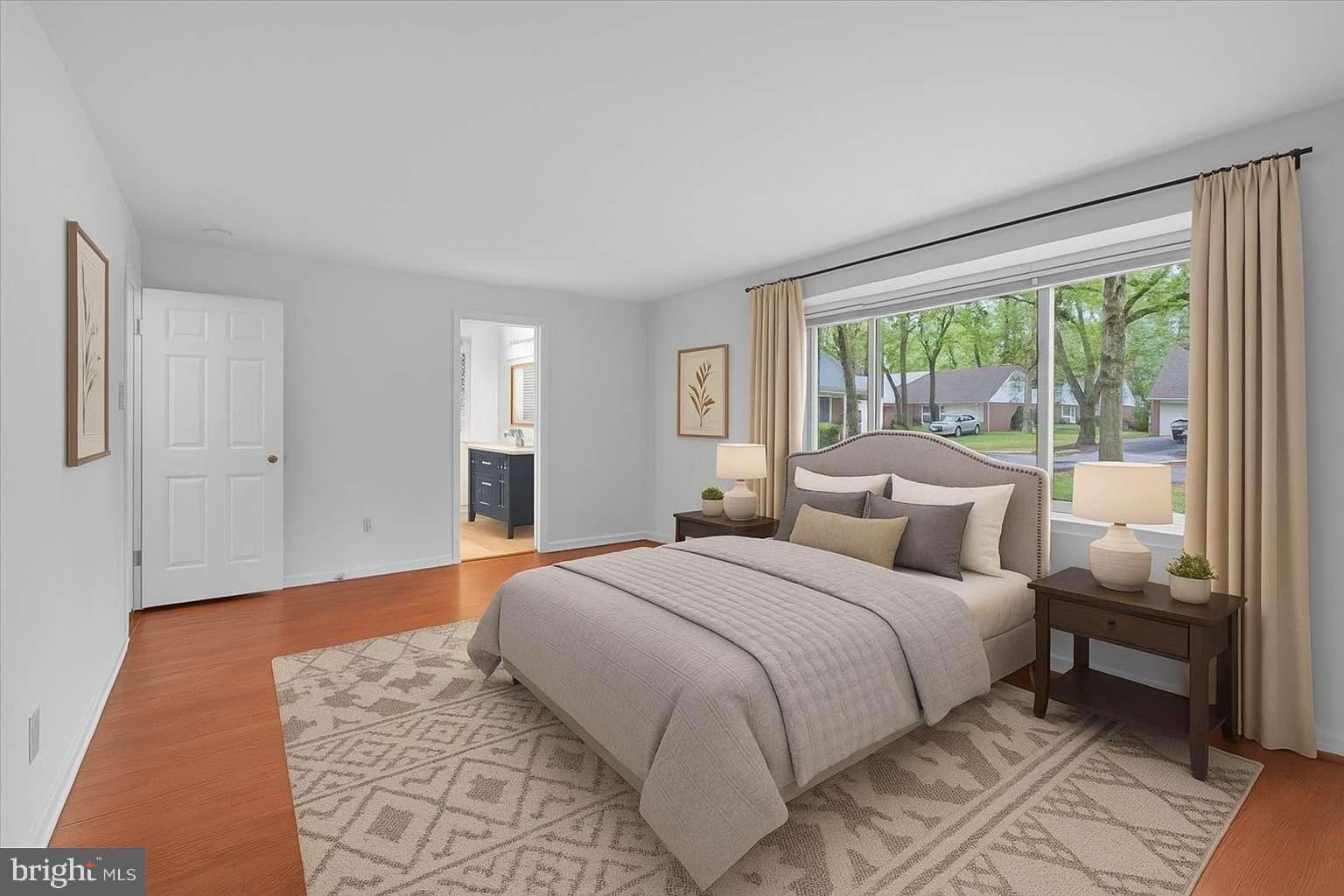 114 Partree Road Cherry Hill, NJ 08003 - Photo 19 of 44 a bedroom with a large bed and a window