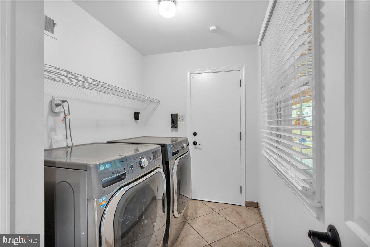 114 Partree Road Cherry Hill, NJ 08003 - Photo 26 of 44 a utility room with dryer and washer