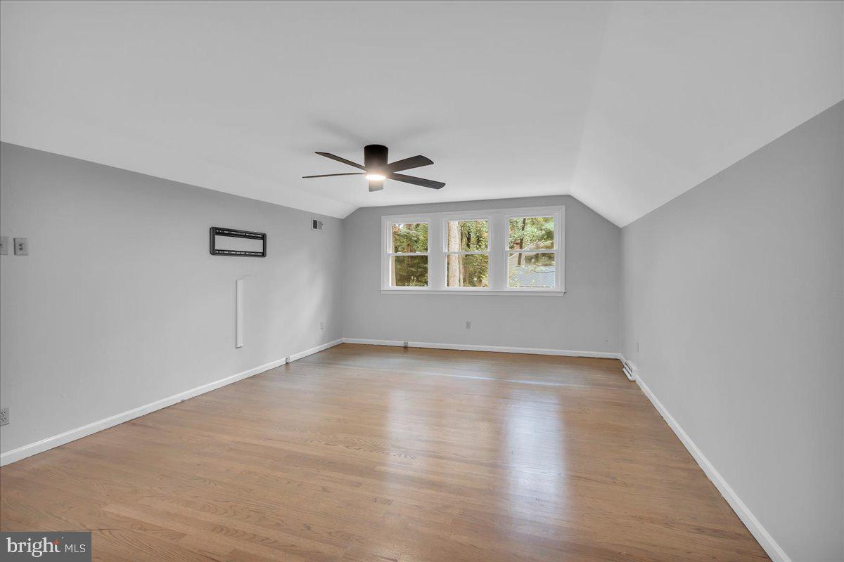 114 Partree Road Cherry Hill, NJ 08003 - Photo 27 of 44 a view of an empty room with a window and wooden floor