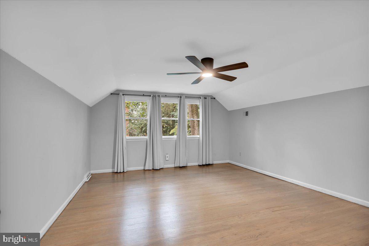 114 Partree Road Cherry Hill, NJ 08003 - Photo 29 of 44 an empty room with wooden floor and windows