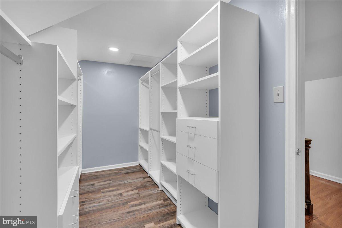 114 Partree Road Cherry Hill, NJ 08003 - Photo 30 of 44 a view of walk in closet with wooden floor