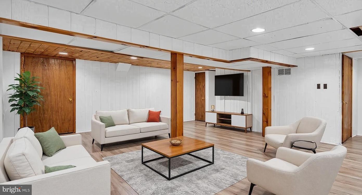 114 Partree Road Cherry Hill, NJ 08003 - Photo 32 of 44 a living room with furniture and a fireplace