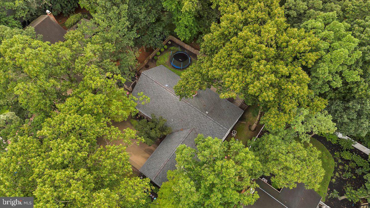 114 Partree Road Cherry Hill, NJ 08003 - Photo 38 of 44 an aerial view of a house with a yard and trees all around