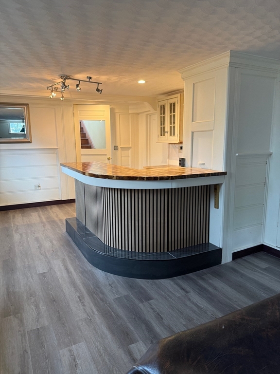 29 Boulevard Road Dedham, MA 02026 - Photo 28 of 34 a view of a hallway with wooden floor