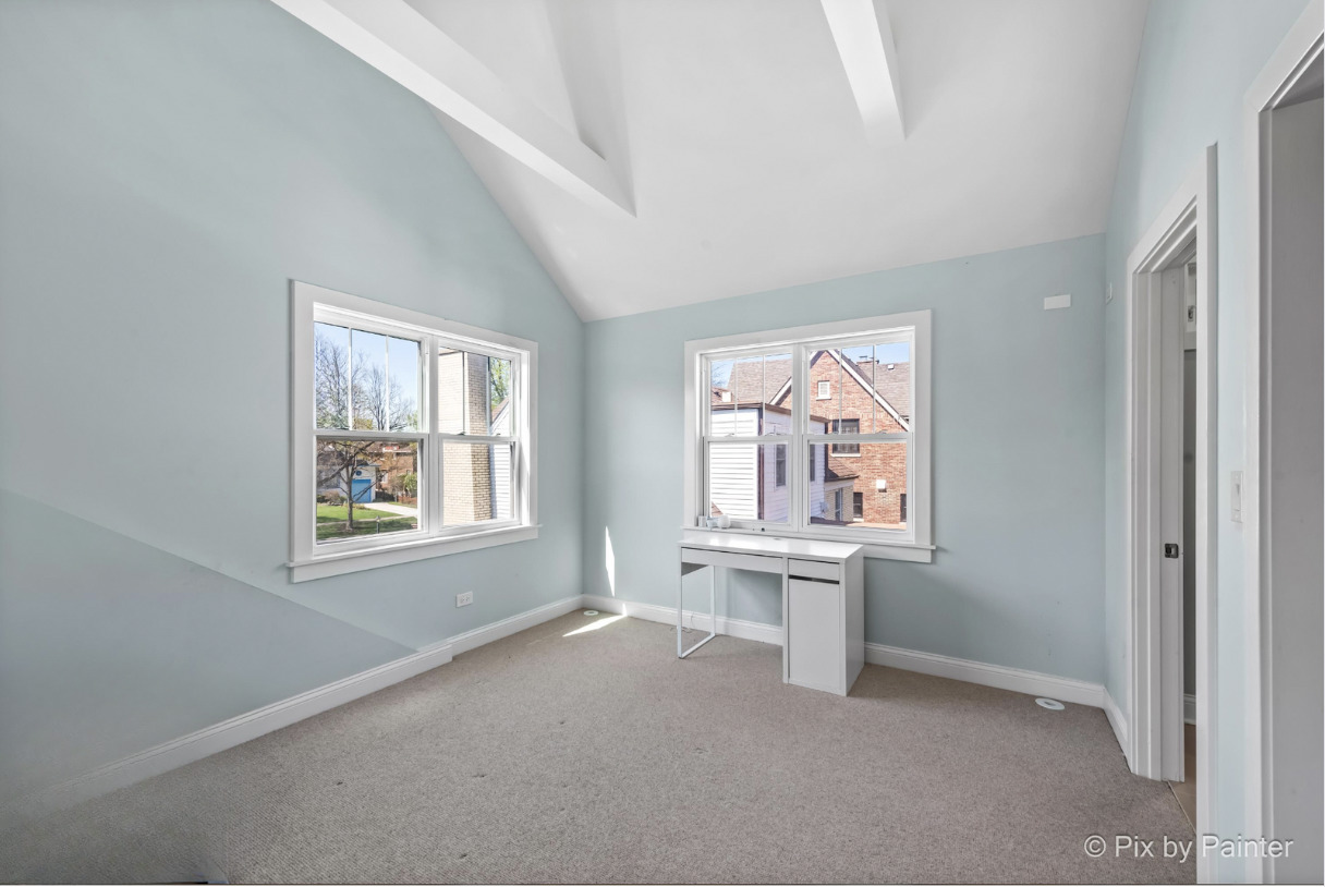 451 Loudon Road Riverside, IL 60546 - Photo 23 of 50 an empty room with windows
