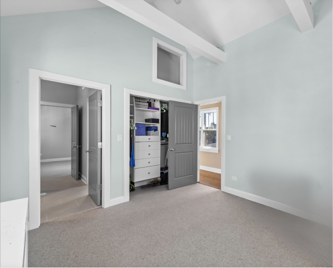 451 Loudon Road Riverside, IL 60546 - Photo 24 of 50 an empty room with closet and mirrors
