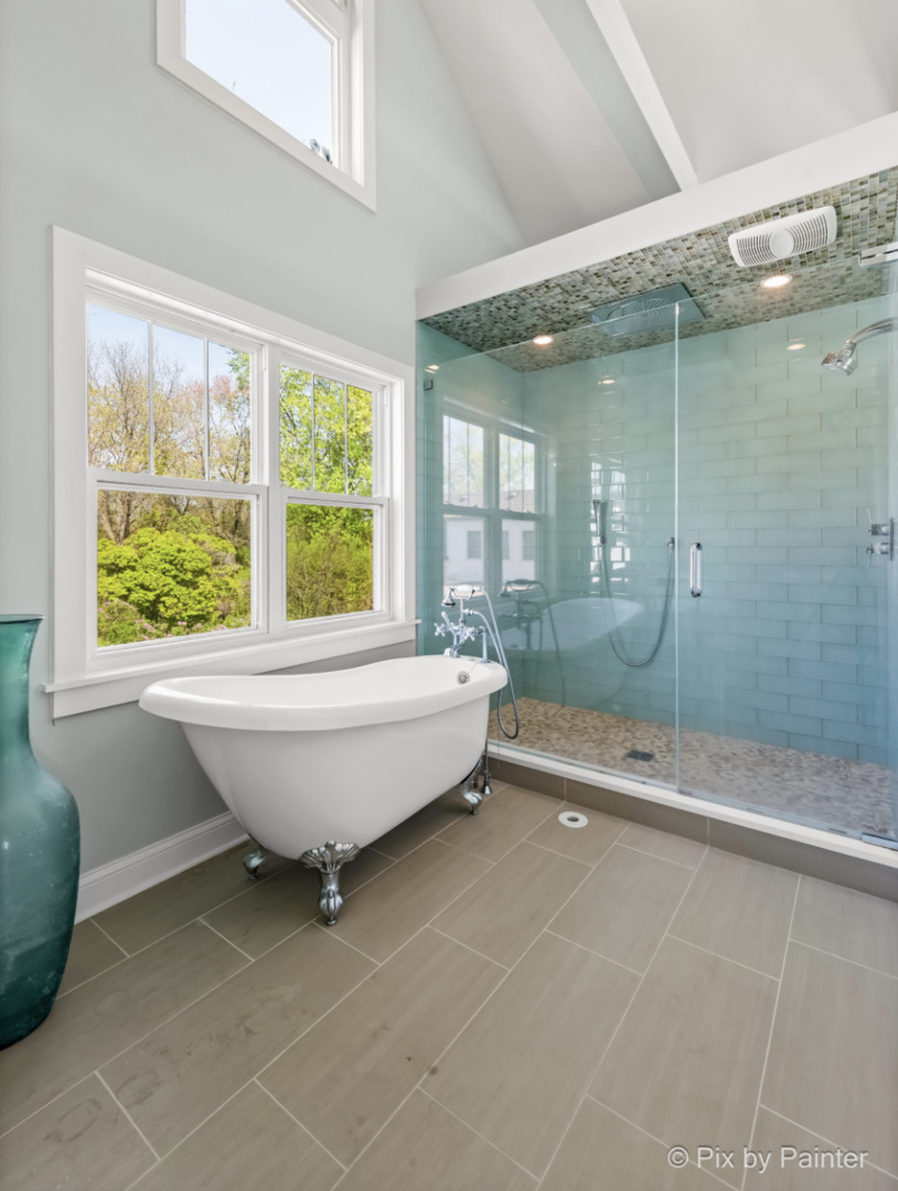 451 Loudon Road Riverside, IL 60546 - Photo 34 of 50 a bathroom with a tub and shower