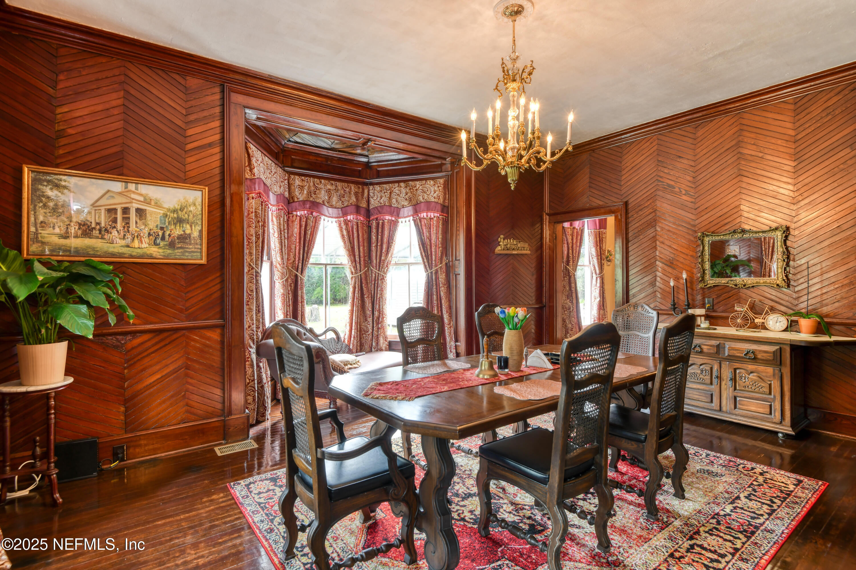 240 Sisco Road Pomona Park, FL 32181 - Photo 18 of 43 a view of a dining room with furniture window and outside view