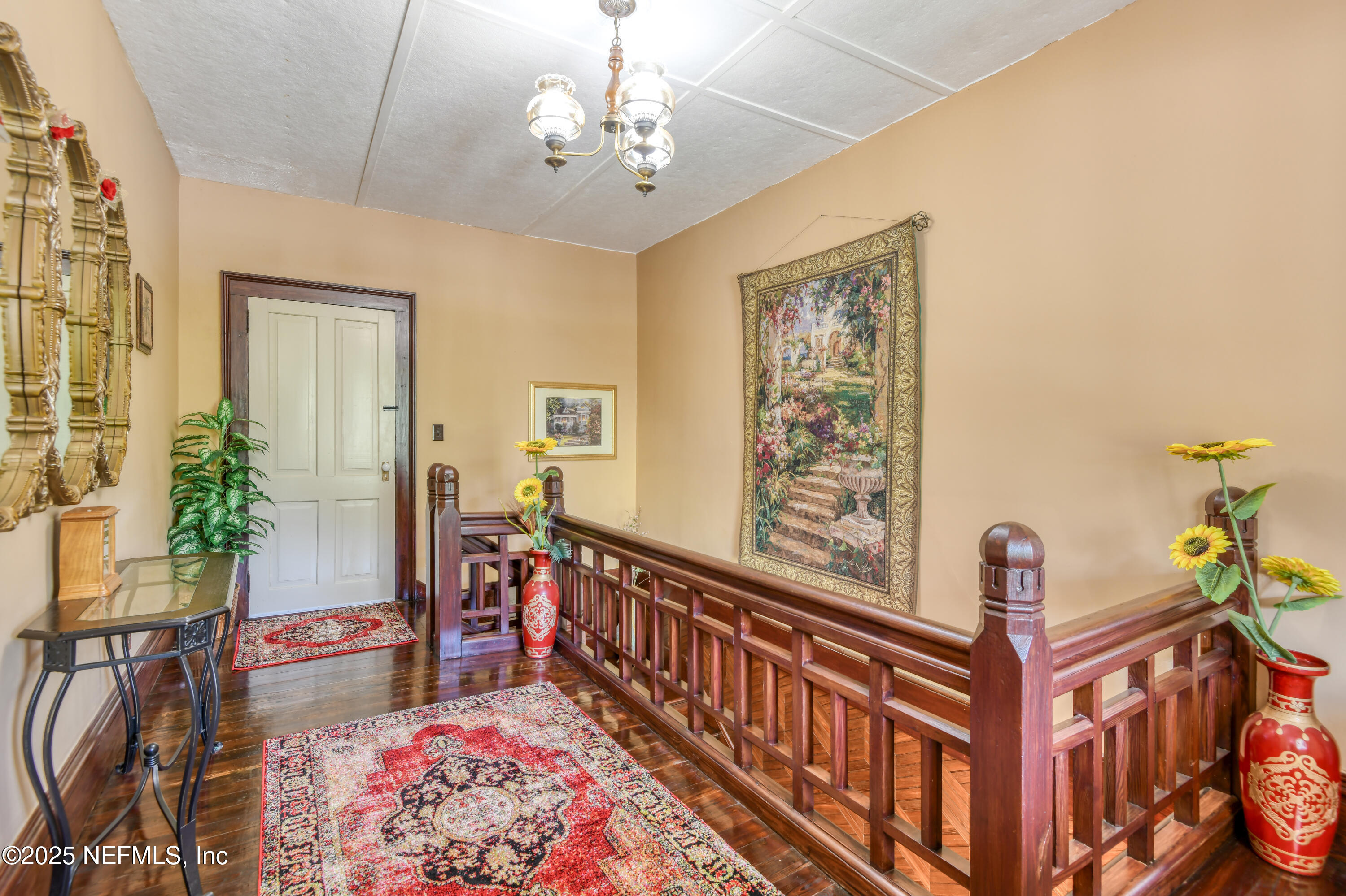 240 Sisco Road Pomona Park, FL 32181 - Photo 23 of 43 a view of a chandelier and living room