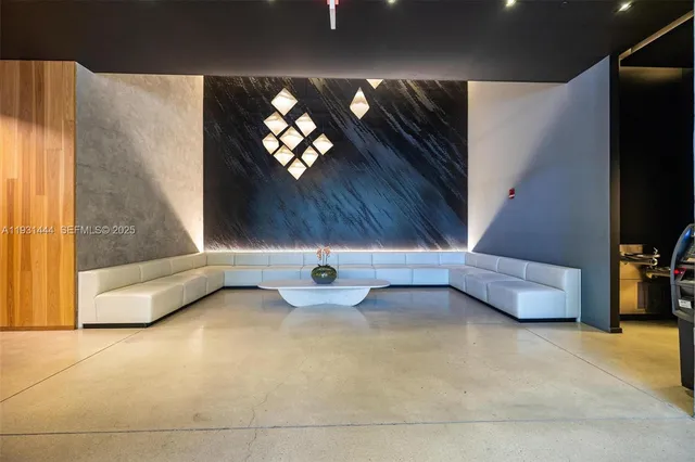 a view of a livingroom with furniture