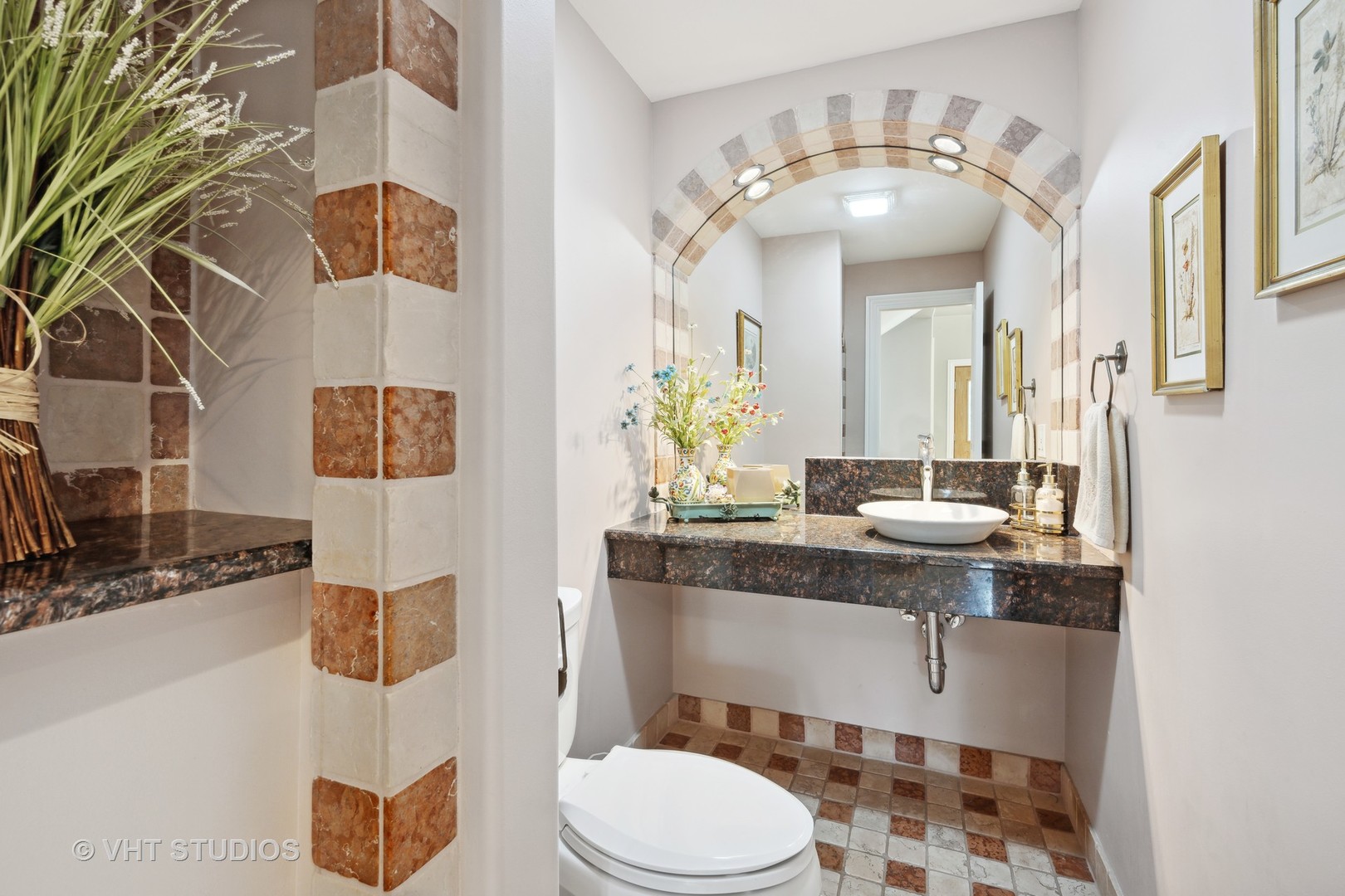 572 Dundee Road Glencoe, IL 60022 - Photo 19 of 26 a bathroom with a granite countertop sink a toilet and a mirror
