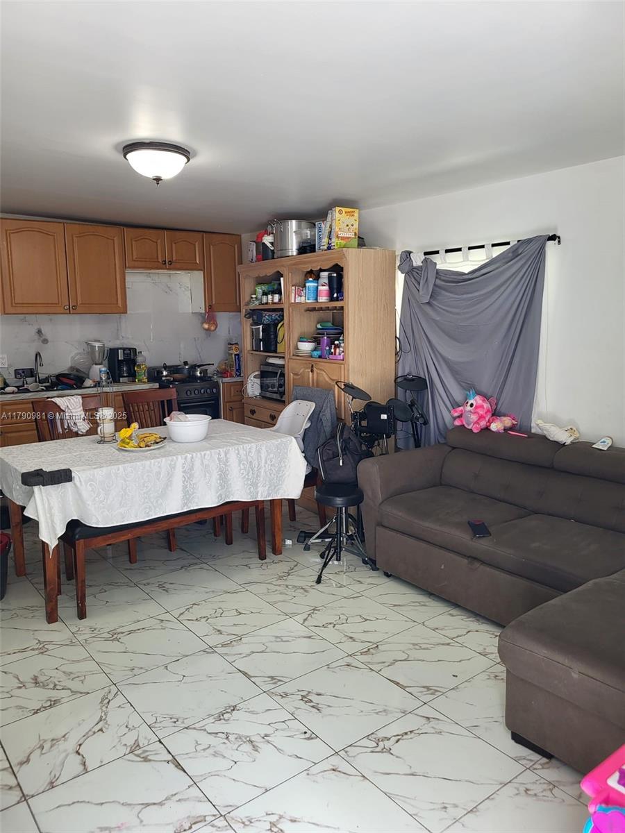 1650 Northeast 147th Street Miami, FL 33181 - Photo 25 of 56 LIVING AREA AND KITCHENETT FOR THE EFFICIENCY