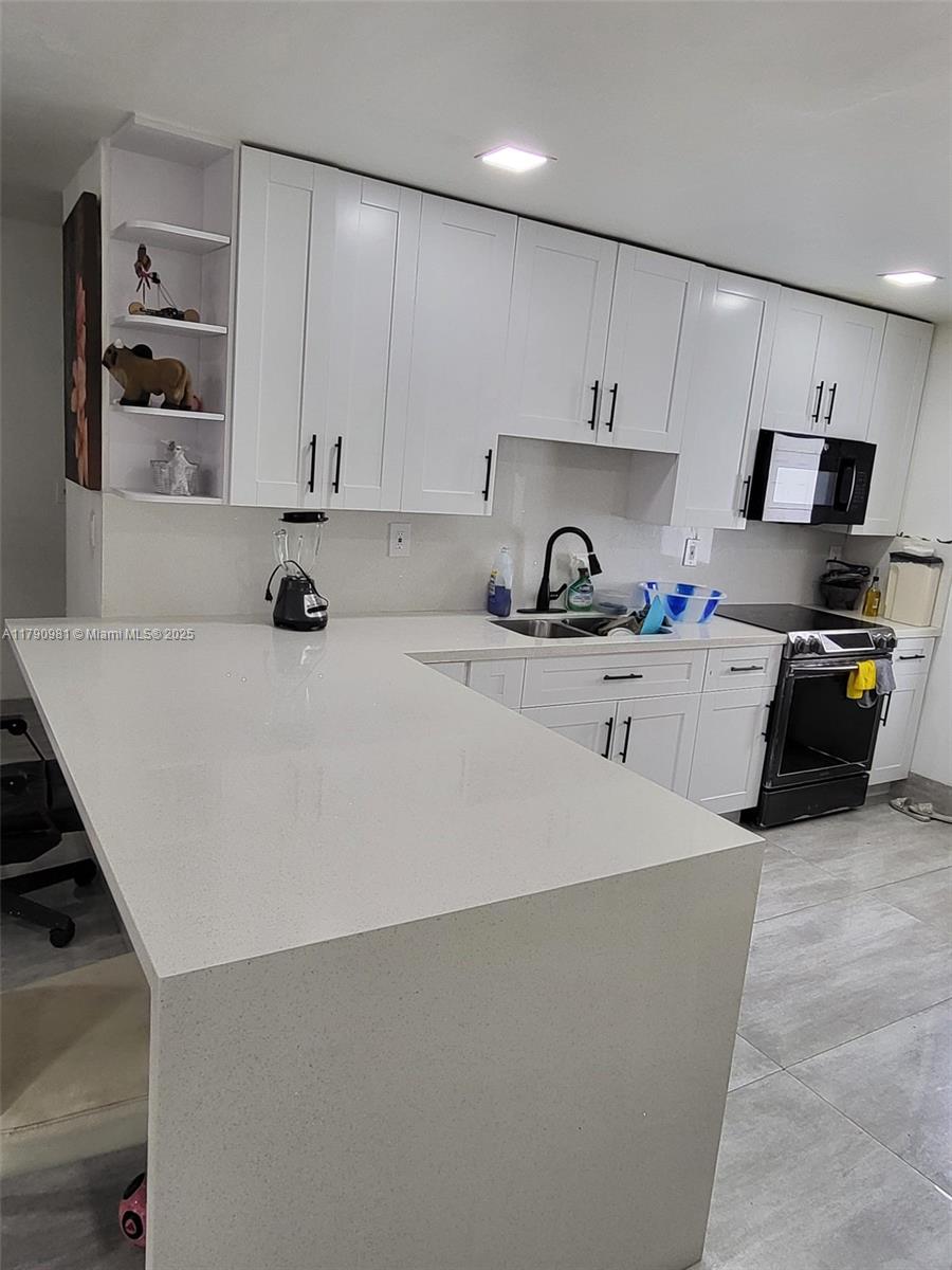 1650 Northeast 147th Street Miami, FL 33181 - Photo 35 of 56 2ND UNIT KITCHEN.