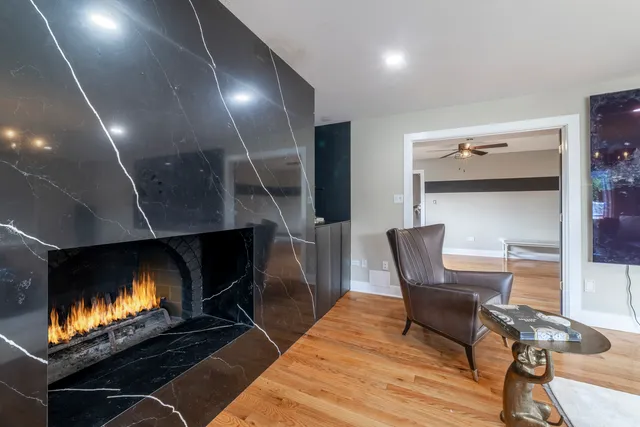 a bathroom with a toilet a sink and shower
