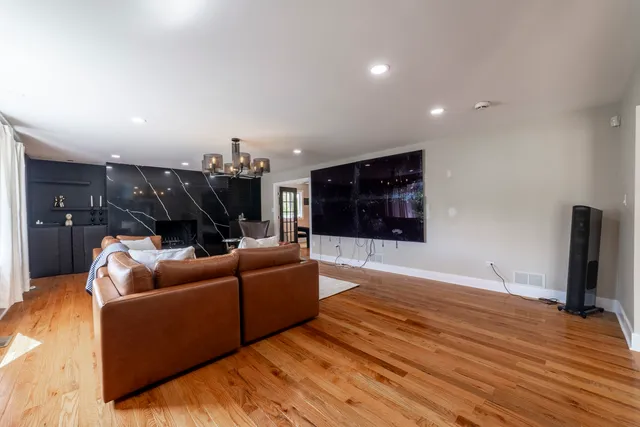 a bedroom with a bed and a table in it