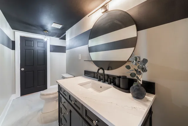 a view of kitchen with furniture and wooden floor