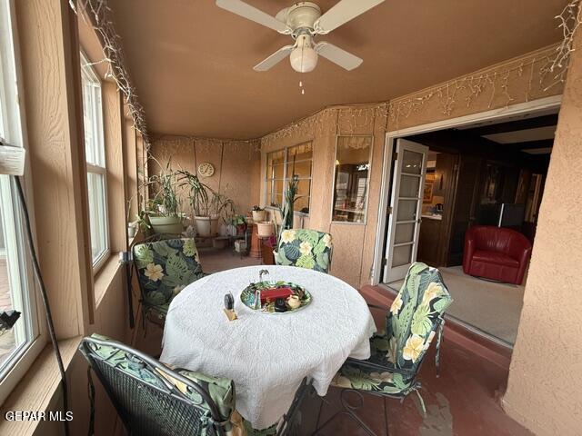 6435 Belton Road El Paso, TX 79912 - Photo 12 of 56 a view of a dining room with furniture and wooden floor