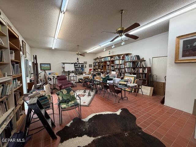 6435 Belton Road El Paso, TX 79912 - Photo 28 of 56 a living room with lots of furniture and a chandelier