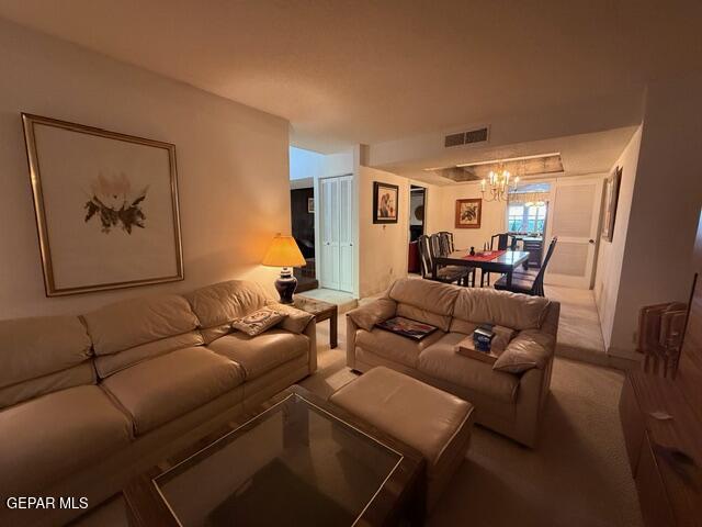 6435 Belton Road El Paso, TX 79912 - Photo 37 of 56 a living room with furniture and a painting
