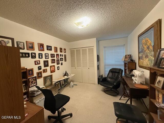 6435 Belton Road El Paso, TX 79912 - Photo 43 of 56 a view of a livingroom with workspace and a couch