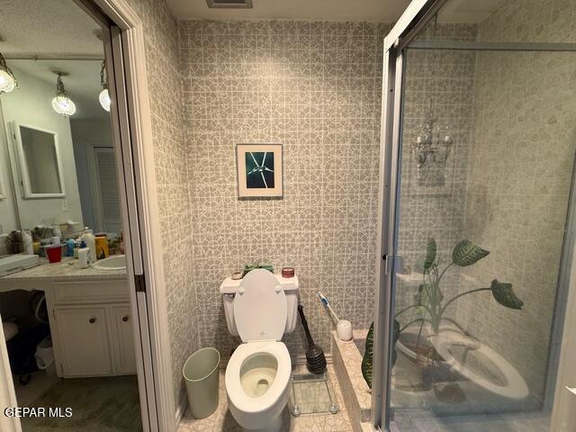 6435 Belton Road El Paso, TX 79912 - Photo 54 of 56 a bathroom with a toilet sink and a shower