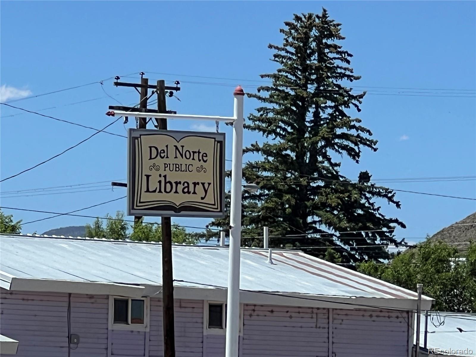 Spruce Street Del Norte, CO 81132 - Photo 23 of 50 a view of a street sign