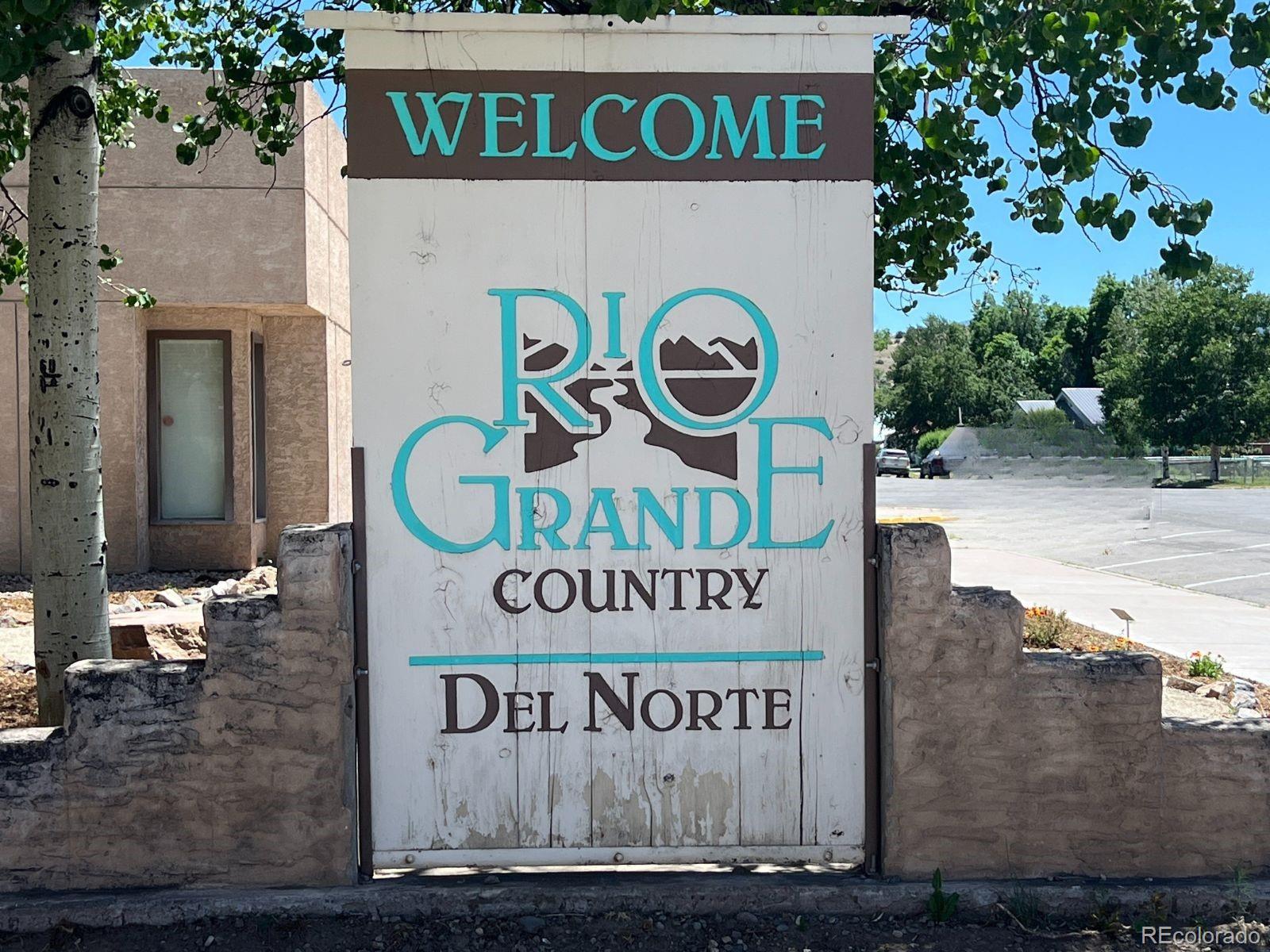 Spruce Street Del Norte, CO 81132 - Photo 35 of 50 a sign that is on a pole