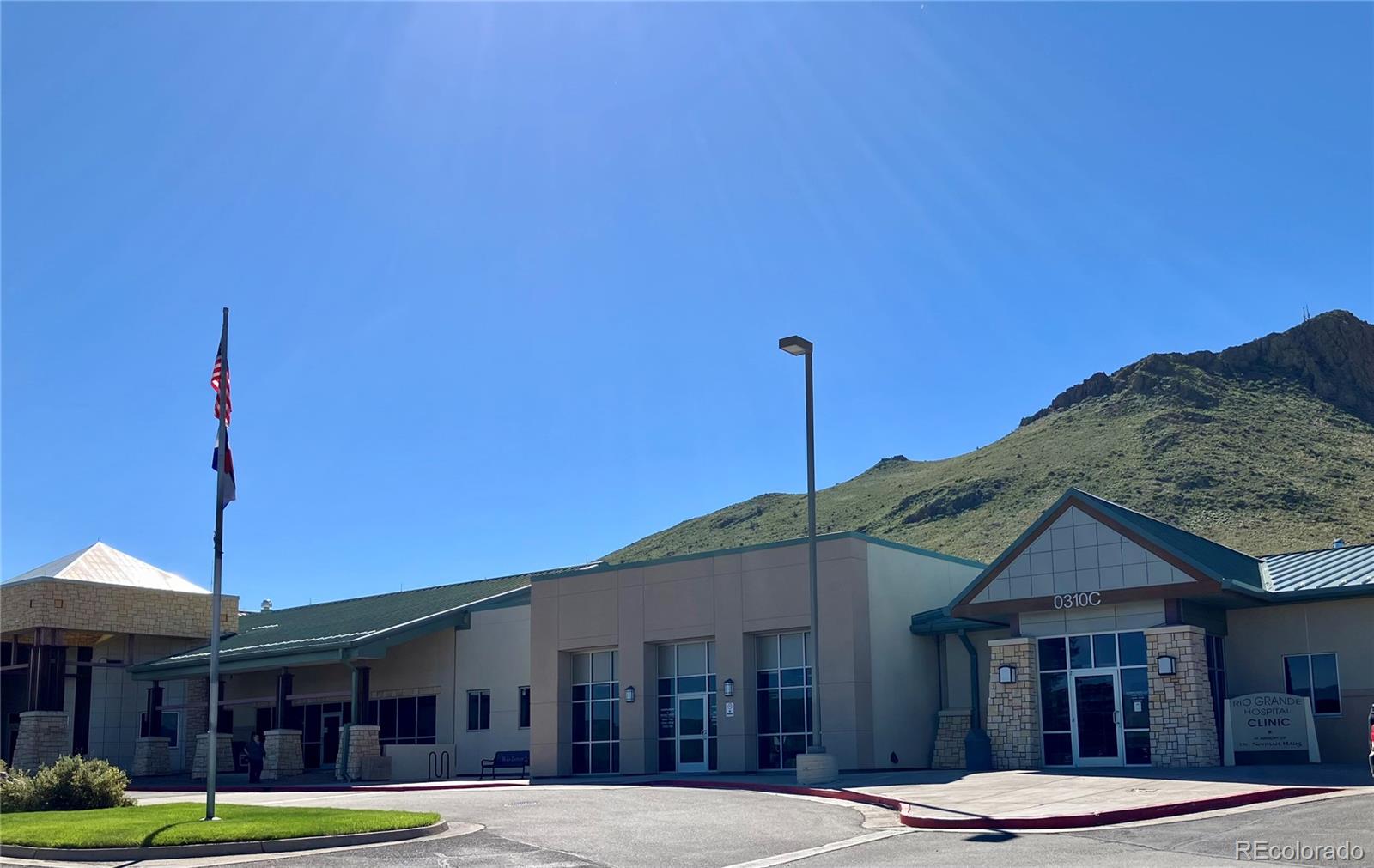 Spruce Street Del Norte, CO 81132 - Photo 44 of 50 a front view of a building and trees