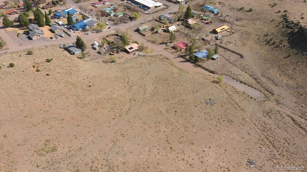 Spruce Street Del Norte, CO 81132 - Photo 44 of 50 a view of a dry yard with a tree