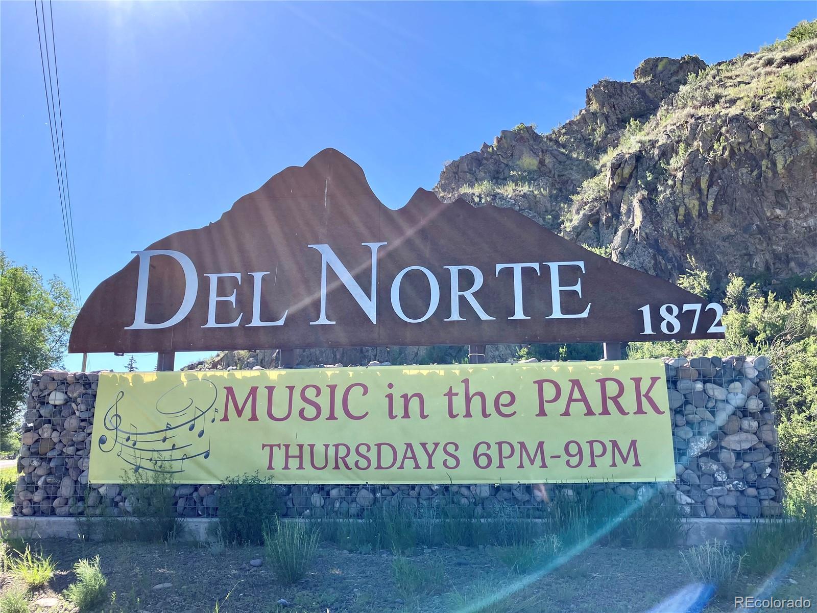 Spruce Street Del Norte, CO 81132 - Photo 45 of 50 a sign that is on the wall of a building