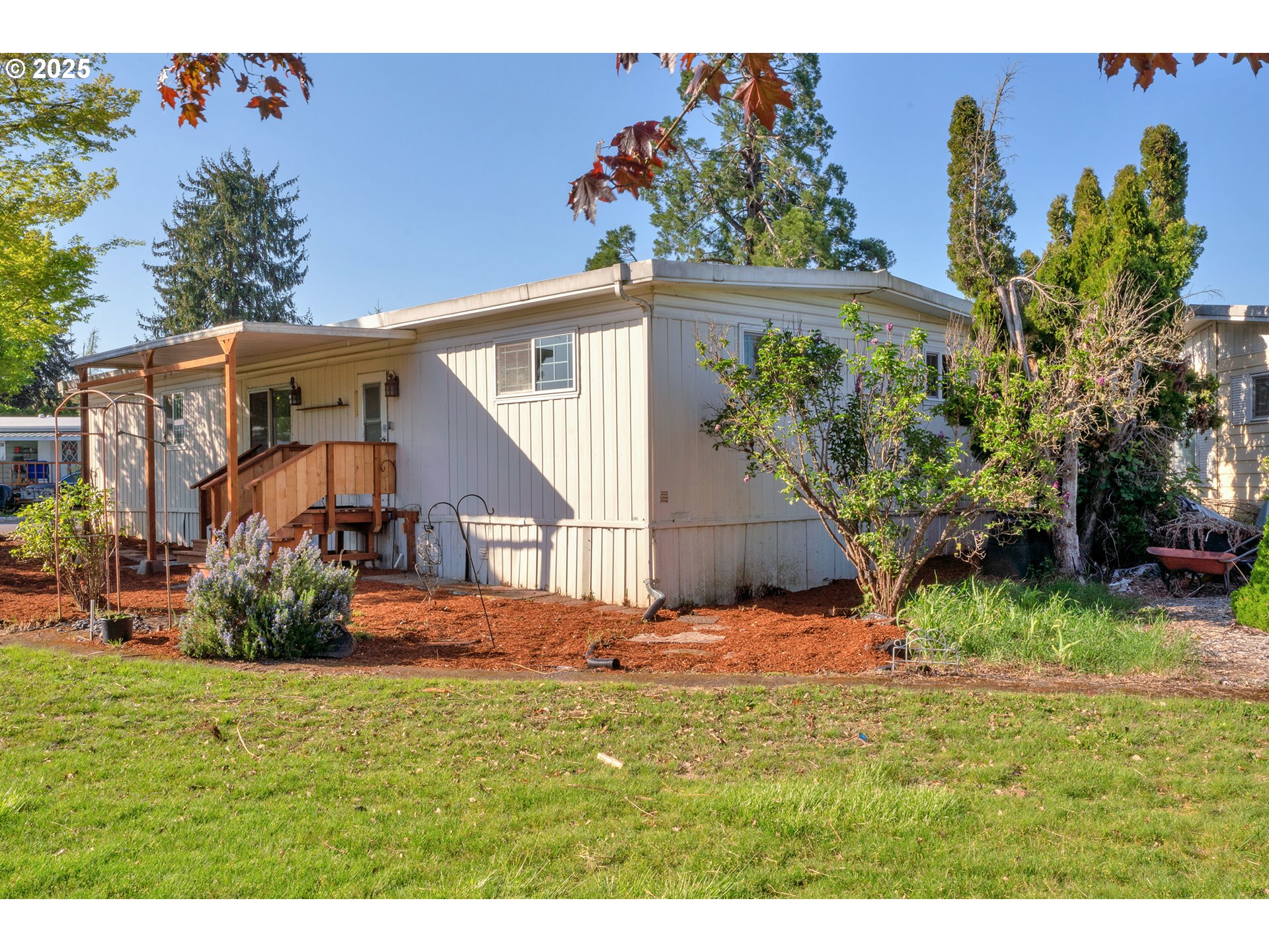 39202 Camp Creek Road, Unit 7 Springfield, OR 97478 - Photo 1 of 39 a view of a house with a yard