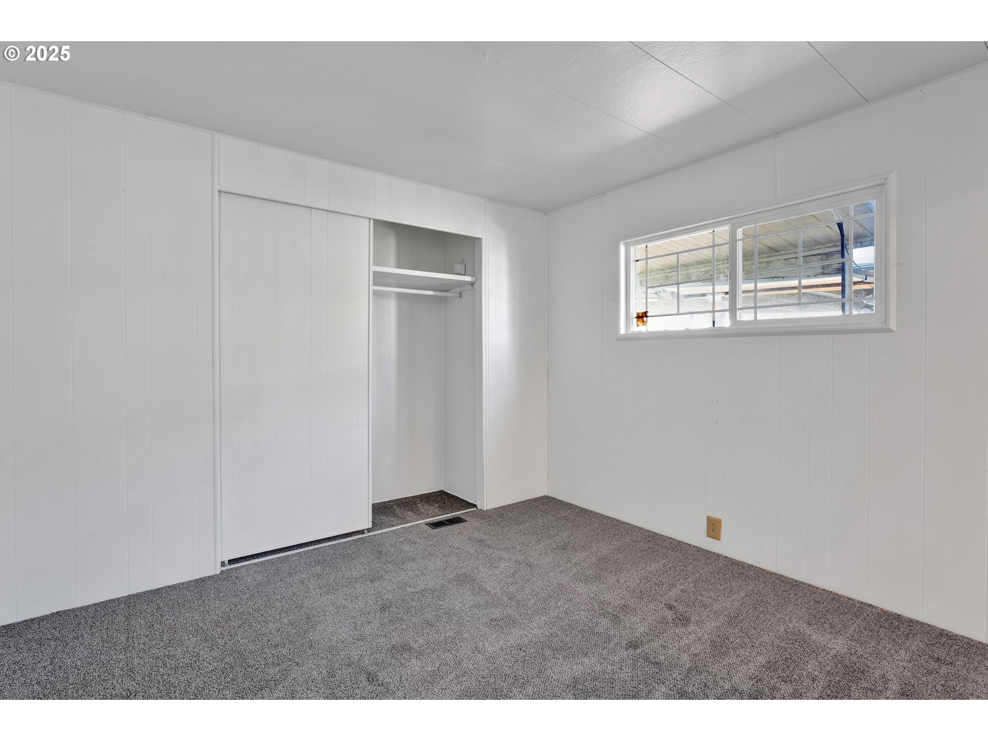 39202 Camp Creek Road, Unit 7 Springfield, OR 97478 - Photo 25 of 39 a view of an empty room with a window
