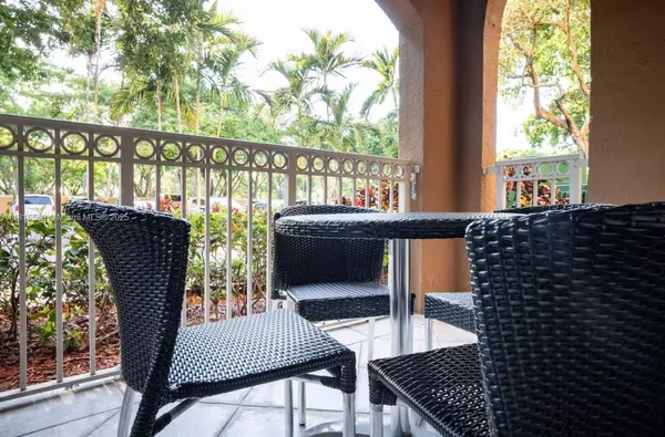 a view of a porch with a garden