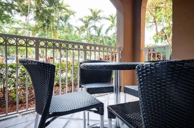 a view of a porch with a garden