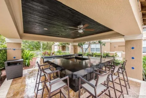 a view of outdoor space yard deck patio and outdoor kitchen
