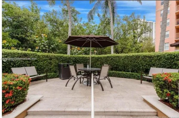 a view of a fountain in the patio of a house