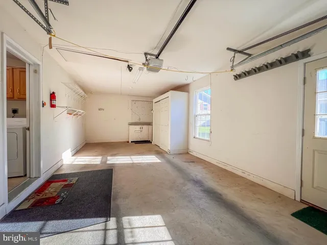 a view of a room with an empty space