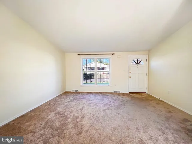 an empty room with an entryway