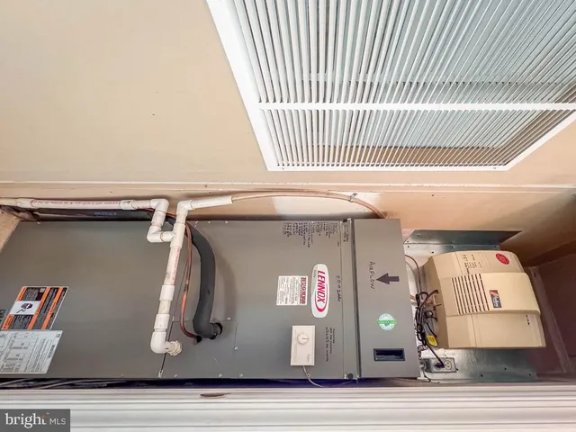 a view of backyard of house with green space