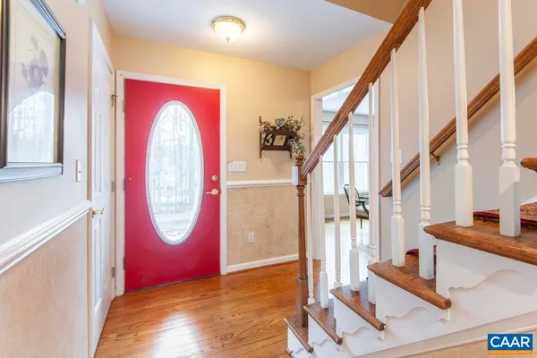 a view of entryway with a front door