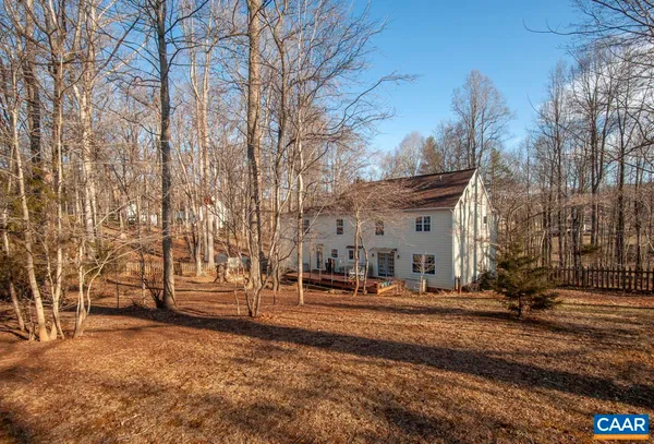 a view of a building with trees