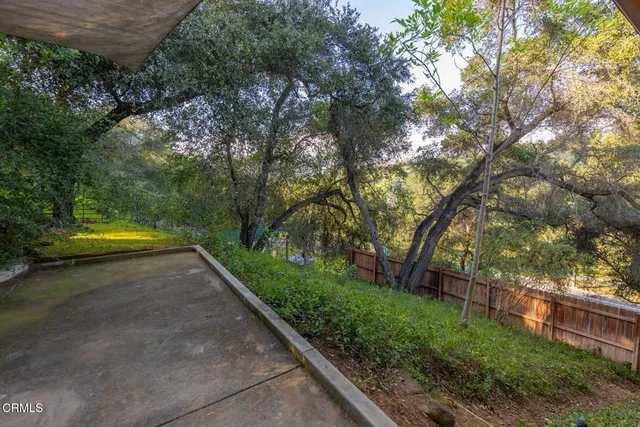 a view of swimming pool with a yard