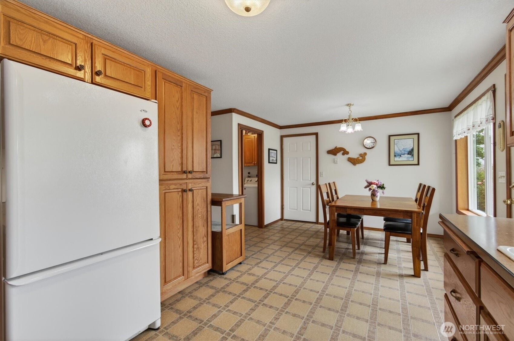 218 West Sunny Sands Road Cathlamet, WA 98612 - Photo 16 of 40 a view of a dining room with furniture